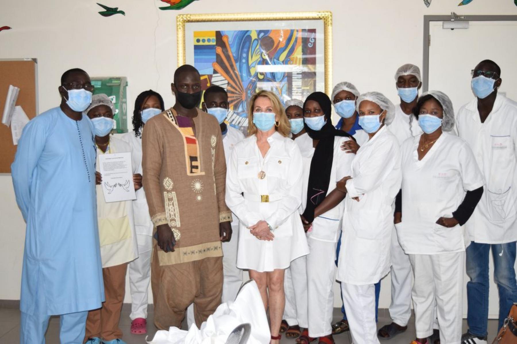 The behind the scenes healthcare workforce are honoured by Senegalese artist gift to CCPC-Dakar